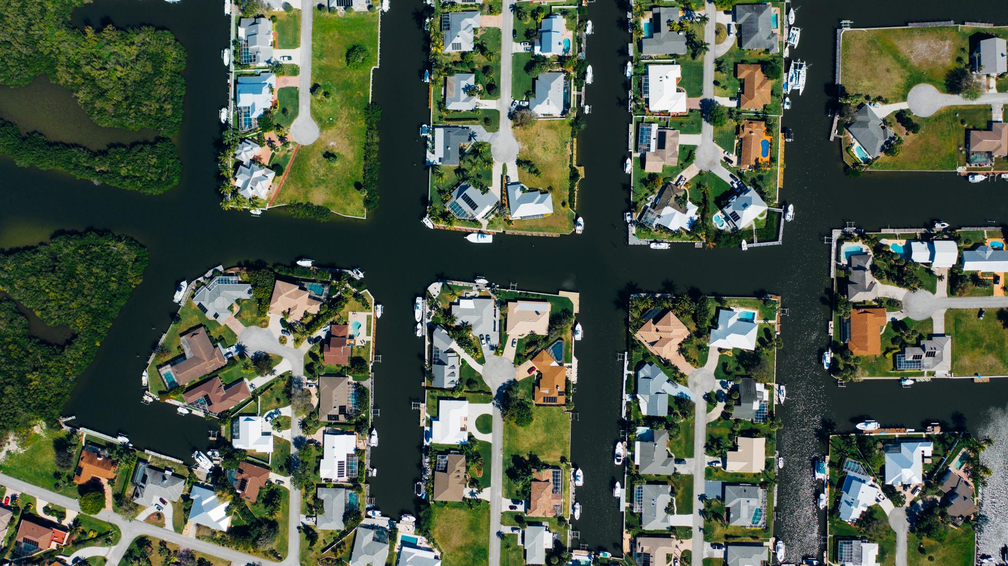 Aerial view of vacation homes in Cape Coral, Florida. Picture credit [Kelly](https://www.pexels.com/photo/aerial-view-of-houses-near-body-of-water-3845103/)