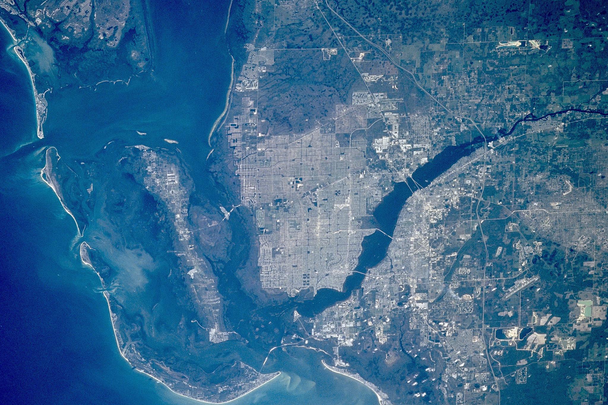 This aerial picture of Cape Coral, Florida shows its unique layout and special geographic features that is intertwined with its fascinating history.